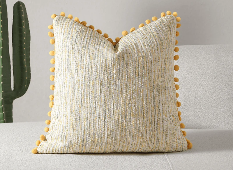 Cojín de tweed amarillo y beige con borlas, 45x45 cm POPINE